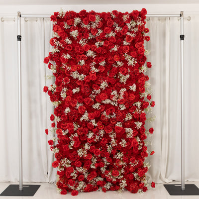 Red floral backdrop featuring roses and baby’s breath for events and décor.