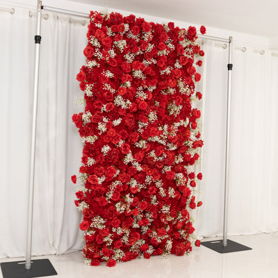 Red floral backdrop with roses and baby's breath for events and photography.
