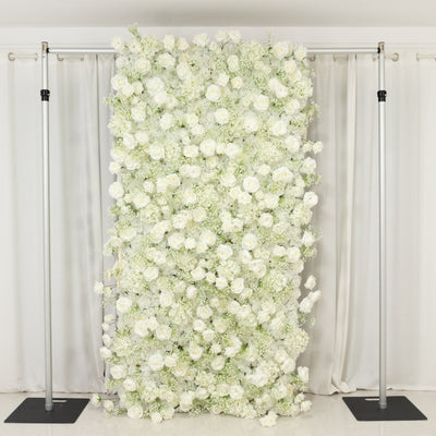 White floral backdrop with roses and greenery for events or photography.