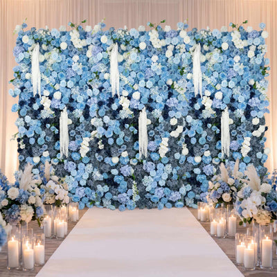 Blue floral wedding backdrop with candles and aisle runner