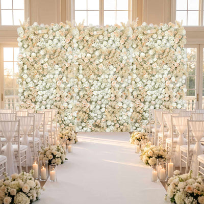 Elegant white floral wedding aisle with candles and ceremony backdrop