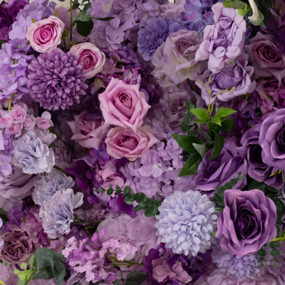 Colorful assortment of artificial purple flowers arranged beautifully.