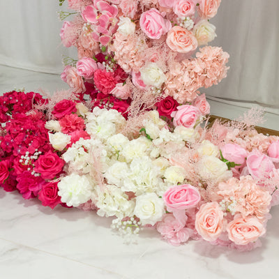 Colorful floral arrangement featuring pink, white, and red flowers.