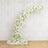 Elegant white floral arch decor in a classic ornate room