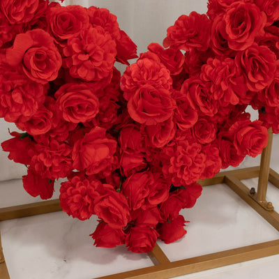 Red rose floral heart arrangement on gold stand