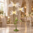 Elegant LED flower floor lamp centerpiece in a luxury banquet hall