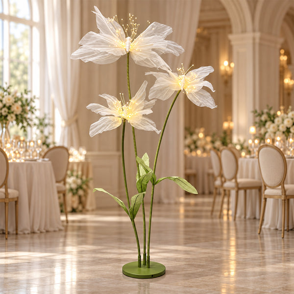Elegant LED flower floor lamp centerpiece in a luxury banquet hall