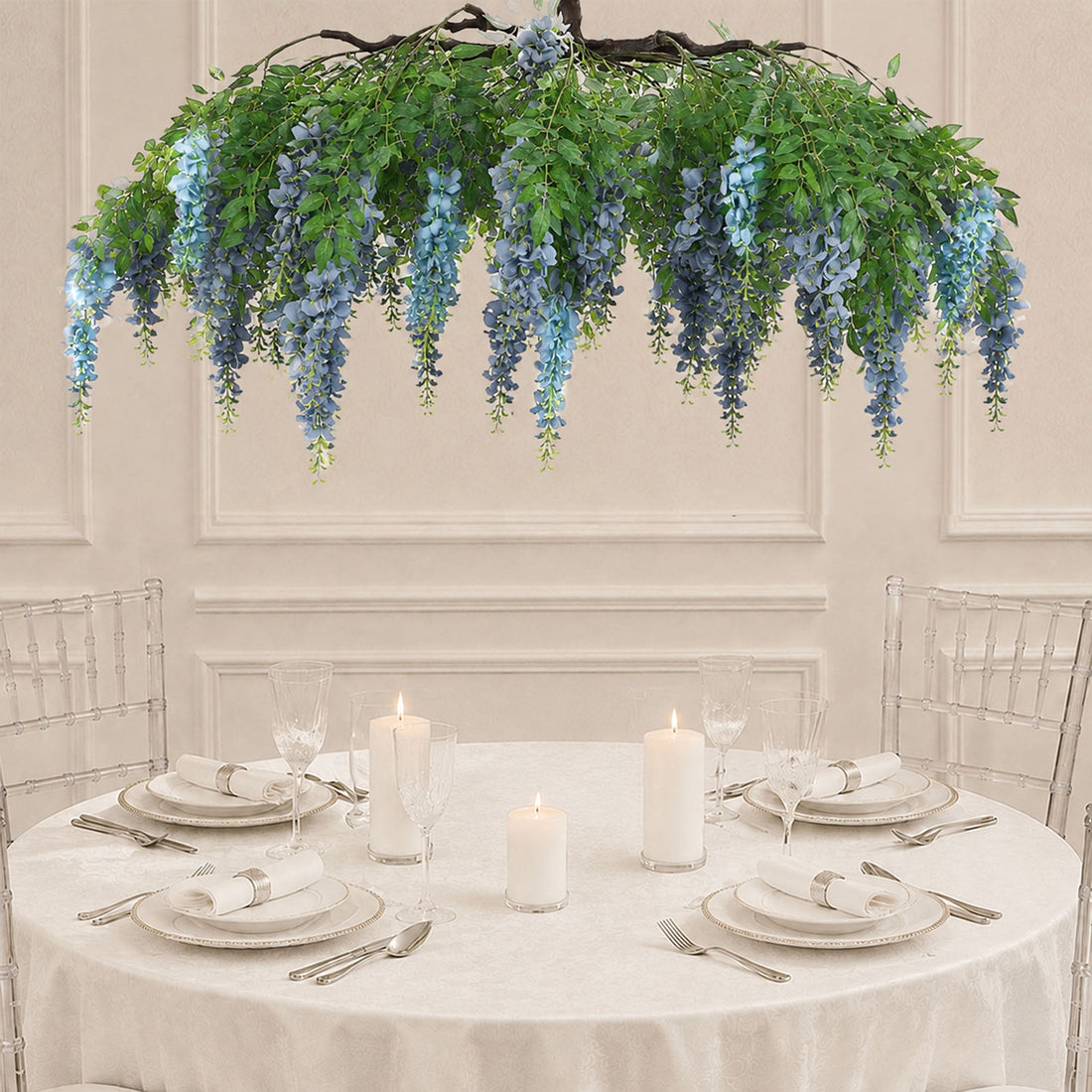Elegant wedding table with blue floral hanging centerpiece and candles