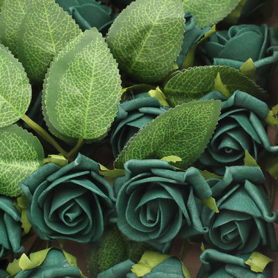 Green fabric roses with leaves arranged closely together.
