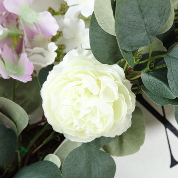 Create a Fresh and Vibrant Atmosphere with the Green Artificial Eucalyptus Leaf and Ranunculus Flower Garland Vine