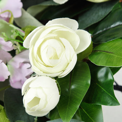 Artificial white roses with green leaves, perfect for home decor.