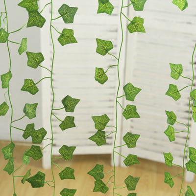 Artificial green ivy garland hanging decor for indoor or outdoor use.