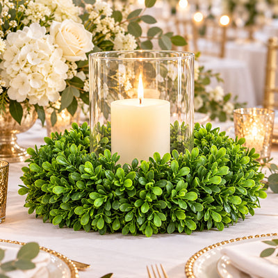 Elegant candle centerpiece with greenery and white floral wedding table decor