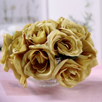 Yellow artificial roses bouquet in a glass vase.