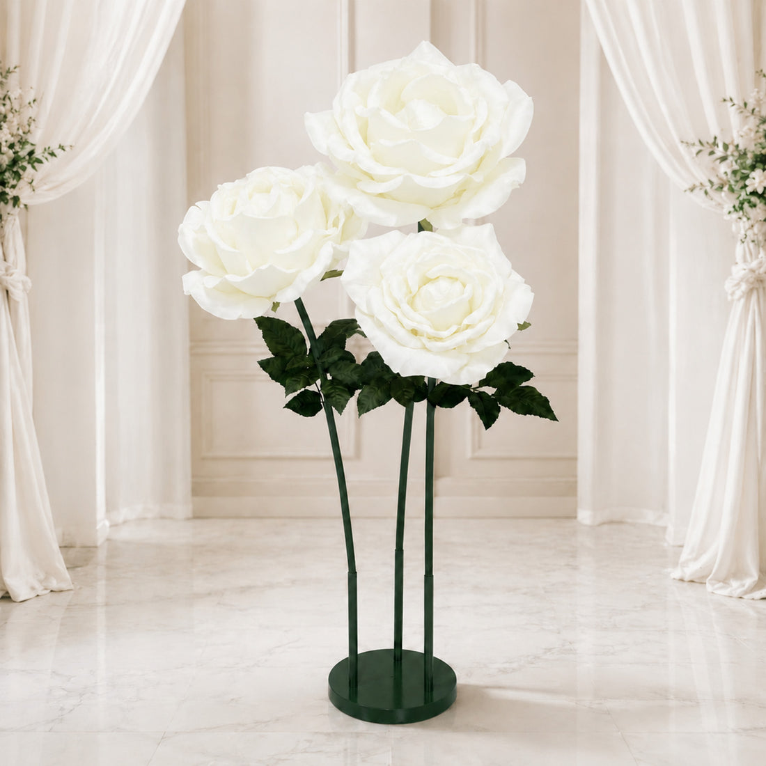 Large white artificial roses on stand in elegant wedding decor setting