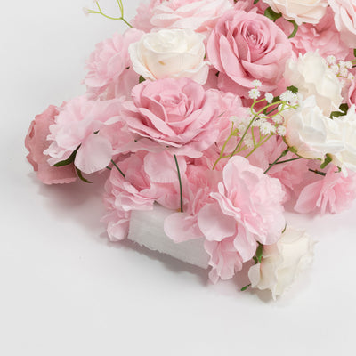 Soft pink and white rose bouquet on a white background