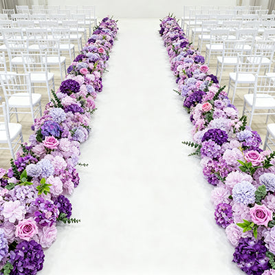 Purple floral aisle decoration for wedding ceremony setup.
