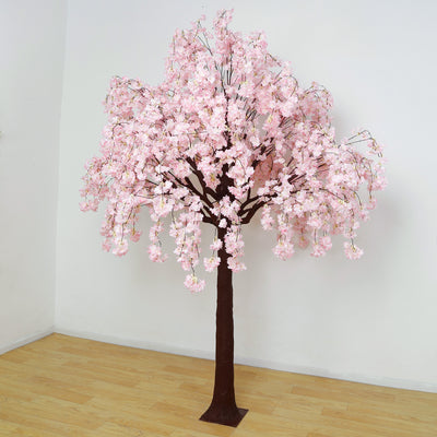 Artificial cherry blossom tree with pink flowers and brown trunk.
