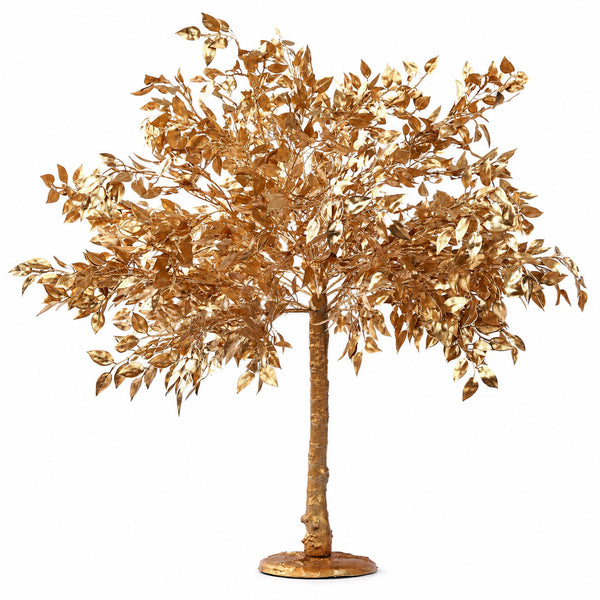 Gold decorative artificial tree sculpture on a white background