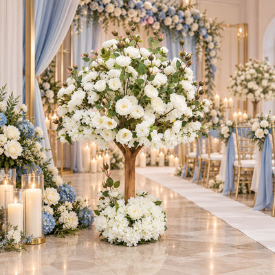 Elegant wedding ceremony floral centerpiece with white roses and blue accents