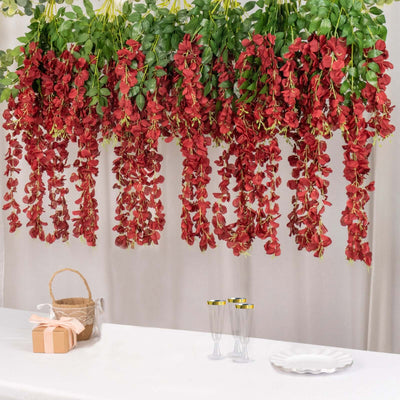 Hanging red flower garland decoration for events or home decor.