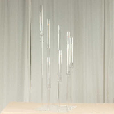 Clear acrylic candle holder in an elegant, modern design.