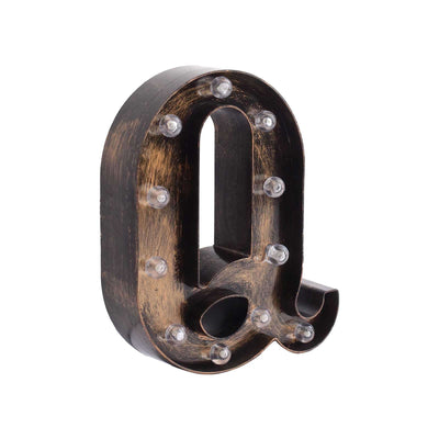 Decorative marquee letter "Q" with lights, vintage style.