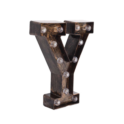 Rustic wooden letter 'Y' with LED lights for decorative use