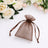 Brown organza drawstring gift pouch on white floral background