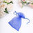 Blue organza drawstring bag on a white background