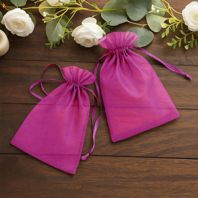 Purple organza drawstring bags for gifts and favors.