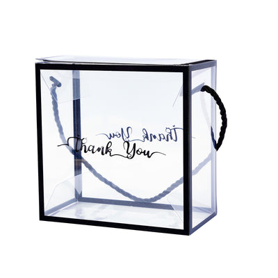 Clear gift bag with \"Thank You\" design and black rope handle #whtbkgd 