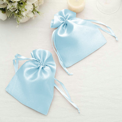 Blue satin drawstring bags for party favors or gifts.