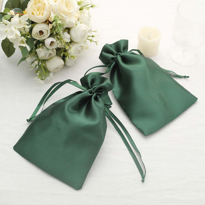 Green satin drawstring bags for gifts or favors.