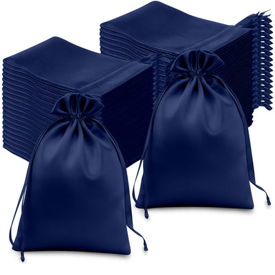 Navy blue satin drawstring bags stacked in a studio shot