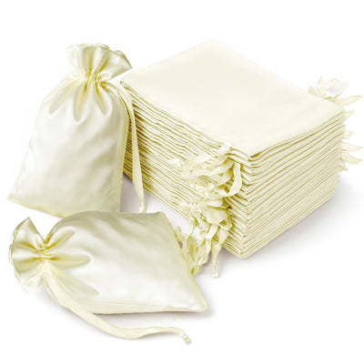Set of ivory satin bags and matching fabric squares for gift wrapping