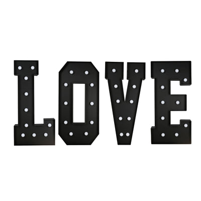 Black marquee letters spelling LOVE with light bulbs on white background#whtbkgd