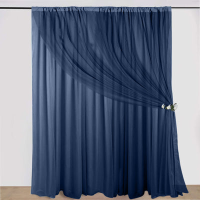 Navy sheer curtain draped elegantly with a decorative tieback