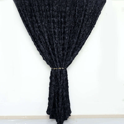 Black textured curtain draped elegantly with a tie at the center.
