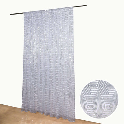Sheer silver patterned curtain on a rod with a close-up detail shot.