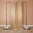 Gold sequin backdrop with floral bases for event decoration.