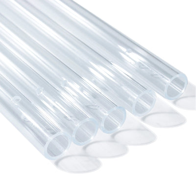 Clear plastic straws in a bundle, showcasing smooth surfaces and rounded edges.