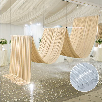 Elegant beige drapery with soft folds in a beautifully decorated event space.