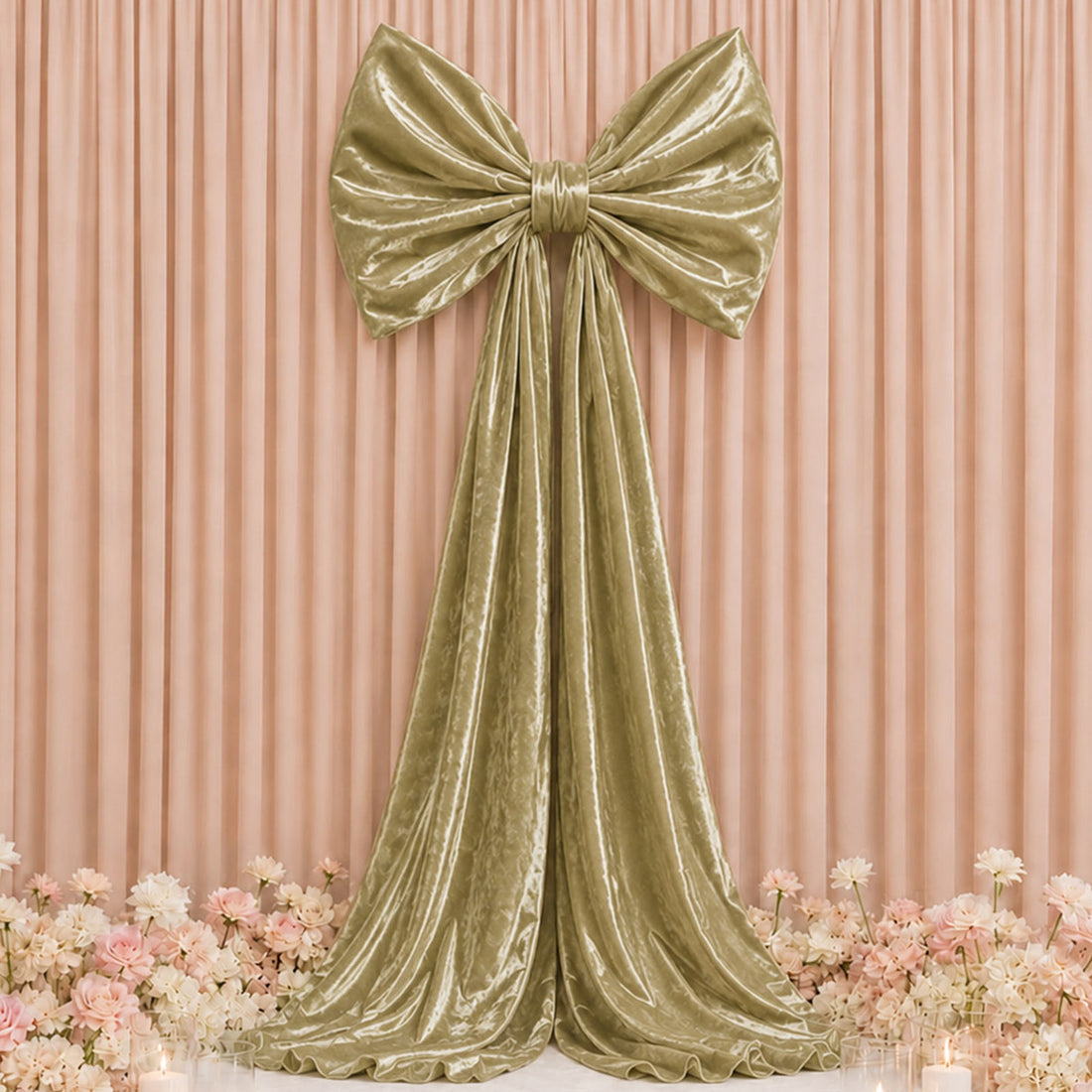Elegant gold velvet bow drape backdrop with pastel flowers for event decor