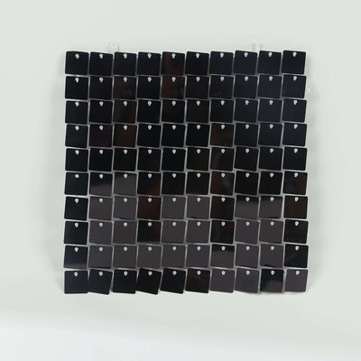 Black square sample tiles arranged in a grid pattern for display.