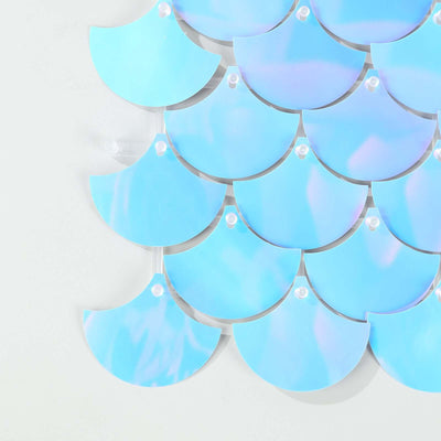 Iridescent blue fan-shaped sequins arranged in a pattern.