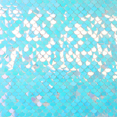 Blue iridescent sequin backdrop for creative projects or events.