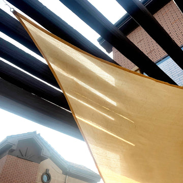 Stay Cool and Protected with the Tan Triangular Sun Shade Sail