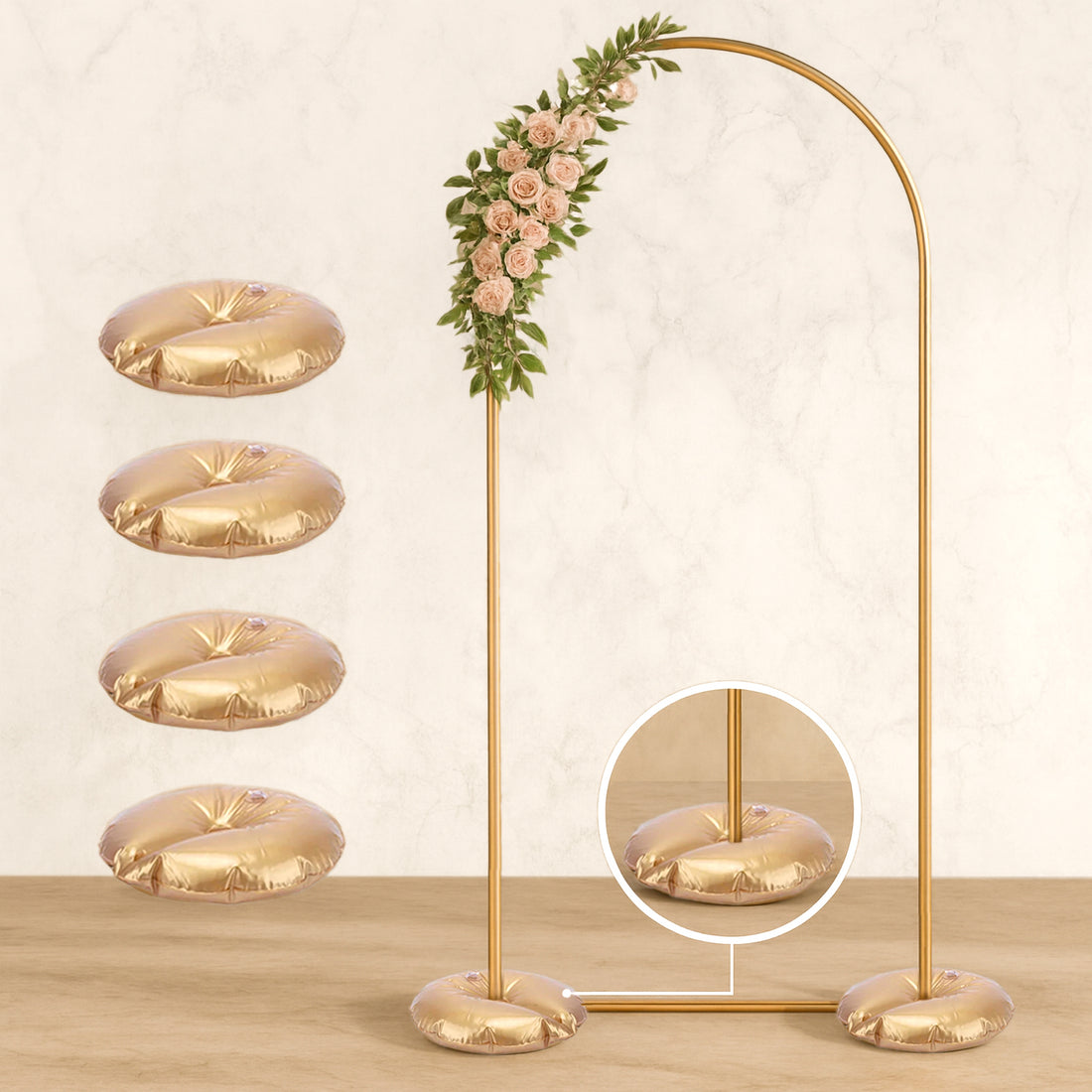Gold circular cushions with floral arch backdrop for event decor.