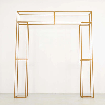 Gold metal display arch with geometric design